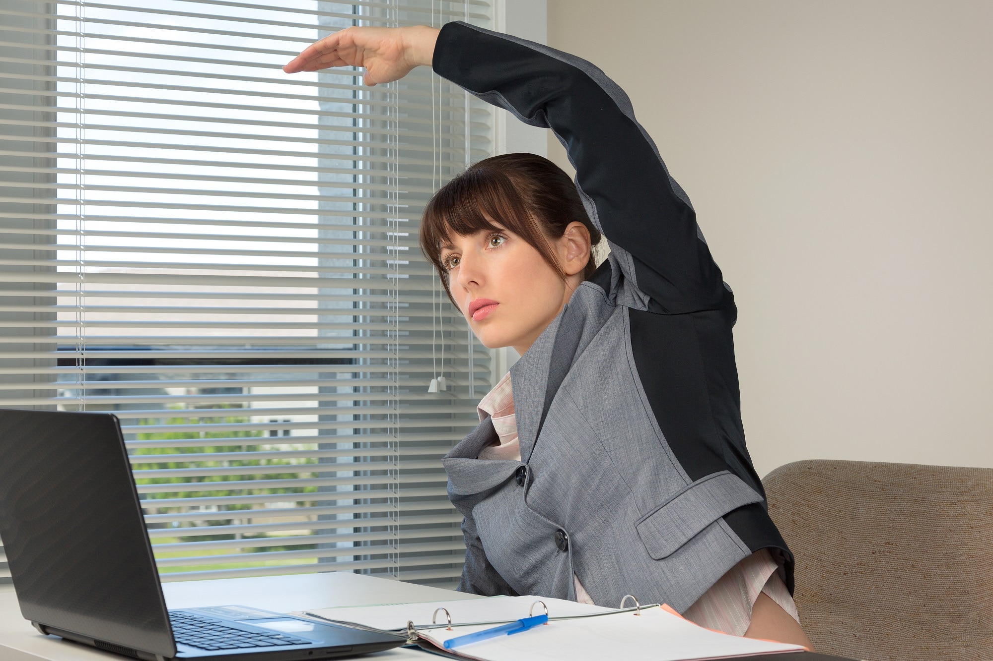 Simple Stretches You Can Do At Your Desk To Relieve Tension - RQ Focus